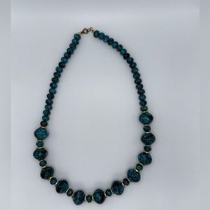 Beautiful blue and black marbled bracket with gold accents